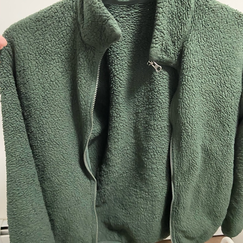 Uniqlo green fleece should be medium size fair condition